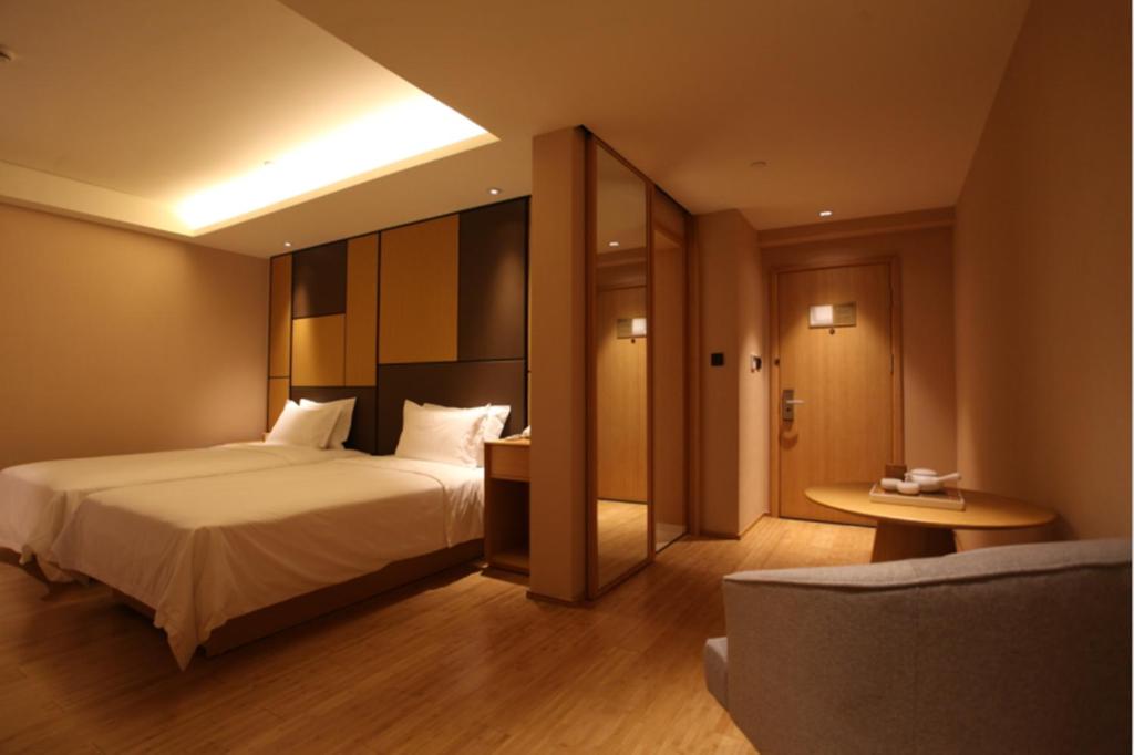Двухместный (Предложение с ограниченным сроком - Двухместный номер с 2 отдельными кроватями) отеля JI Hotel Shanghai Kangqiao Xiuyan Road, Шанхай