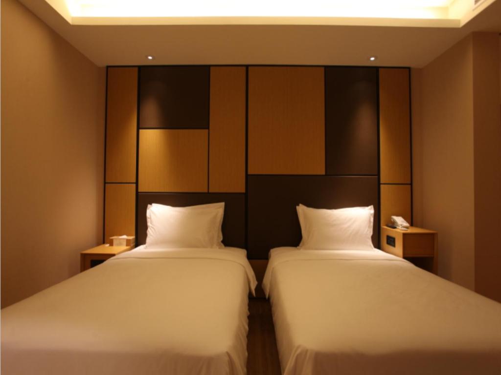 Двухместный (Двухместный номер с 2 отдельными кроватями) отеля JI Hotel Shanghai Kangqiao Xiuyan Road, Шанхай