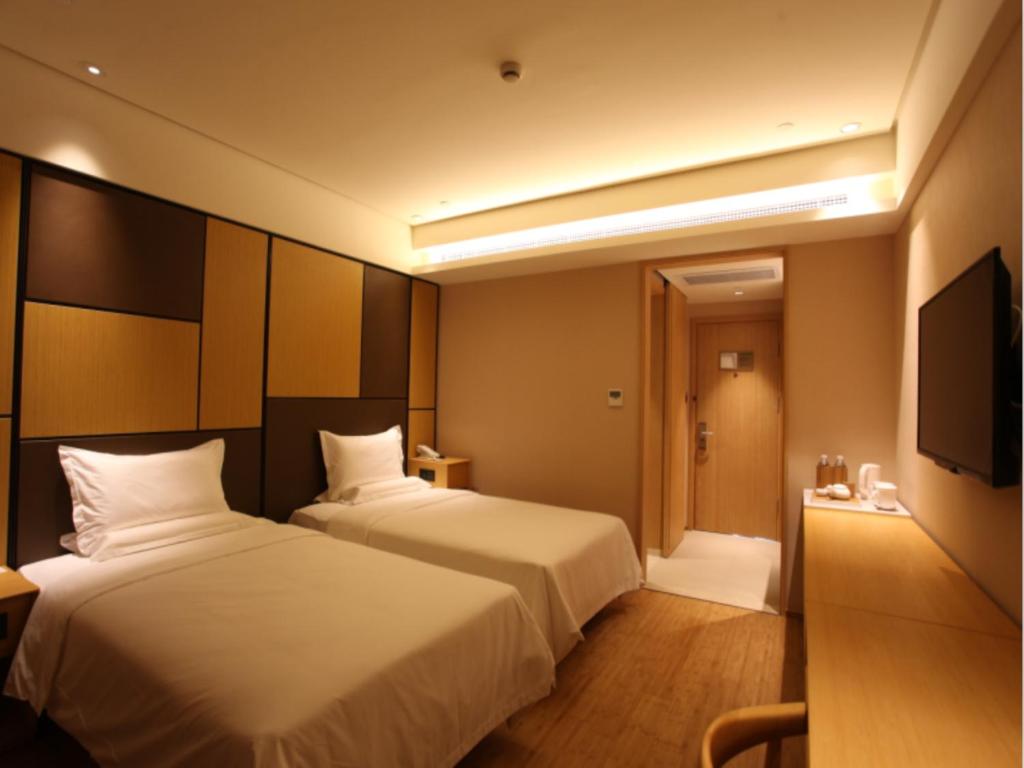 Двухместный (Zero Pressure - Двухместный номер с 2 отдельными кроватями) отеля JI Hotel Shanghai Kangqiao Xiuyan Road, Шанхай
