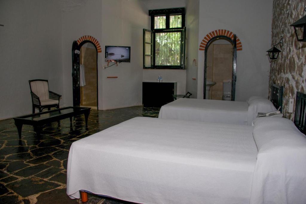 Двухместный (Двухместный номер с 2 отдельными кроватями) отеля Hotel Hacienda Vista Hermosa, Текескитенго