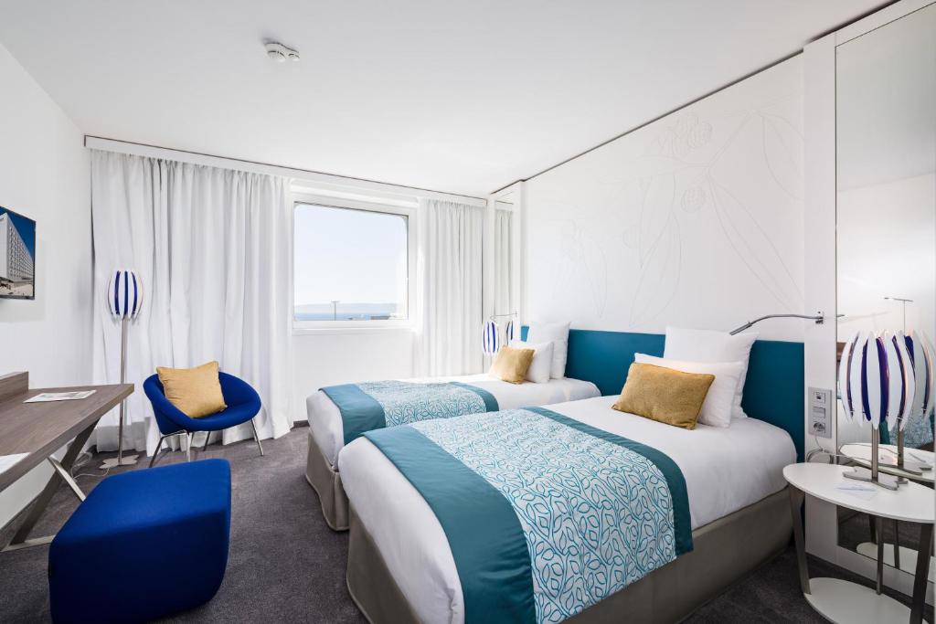 Двухместный (Улучшенный двухместный номер с 2 отдельными кроватями) отеля Golden Tulip Marseille Euromed, Марсель