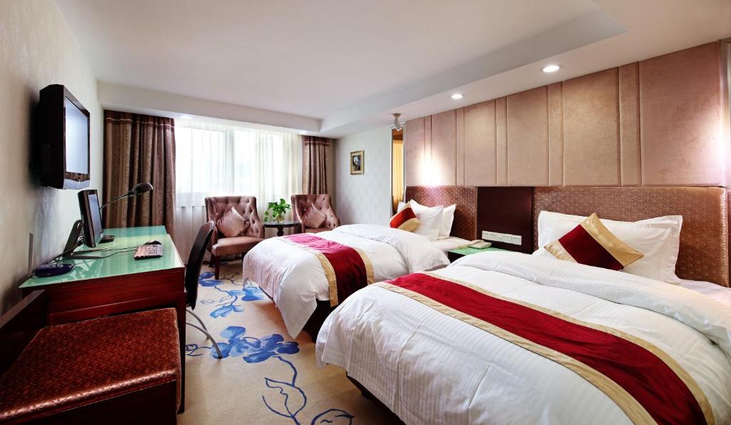Двухместный (Двухместный номер бизнес-класса с 2 отдельными кроватями) отеля New World Hotel with private parking, Гуанчжоу