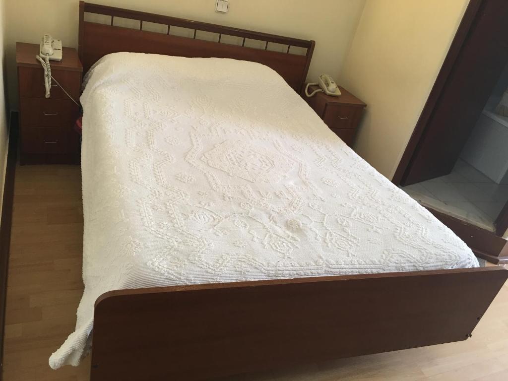 Двухместный (Двухместный номер с 1 кроватью или 2 отдельными кроватями и собственной ванной комнатой) гостевого дома Residencial Central, Калдаш-да-Раинья