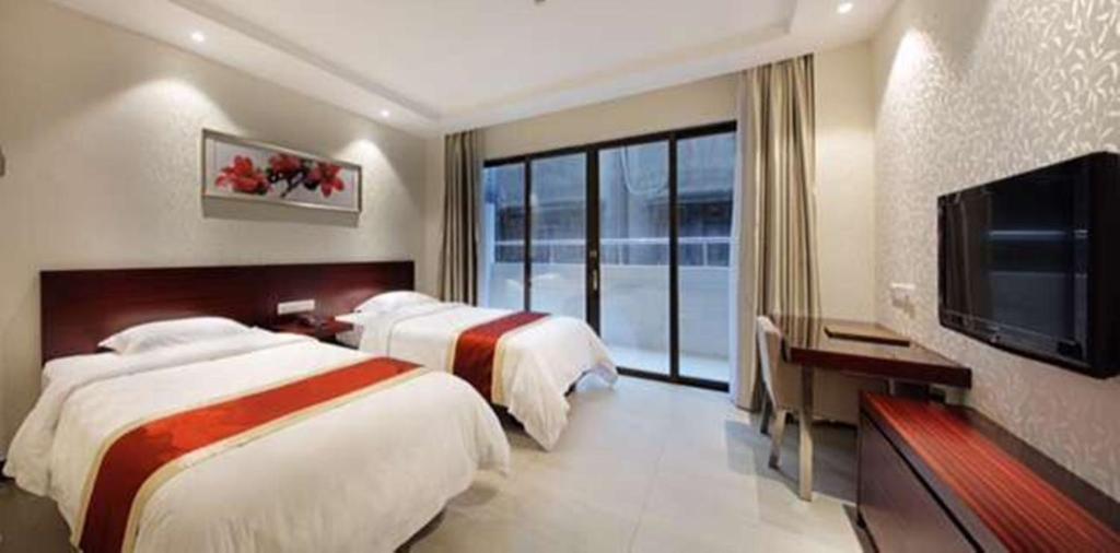 Двухместный (Двухместный номер бизнес-класса с 2 отдельными кроватями) отеля Nanfang Dasha Hotel, Гуанчжоу