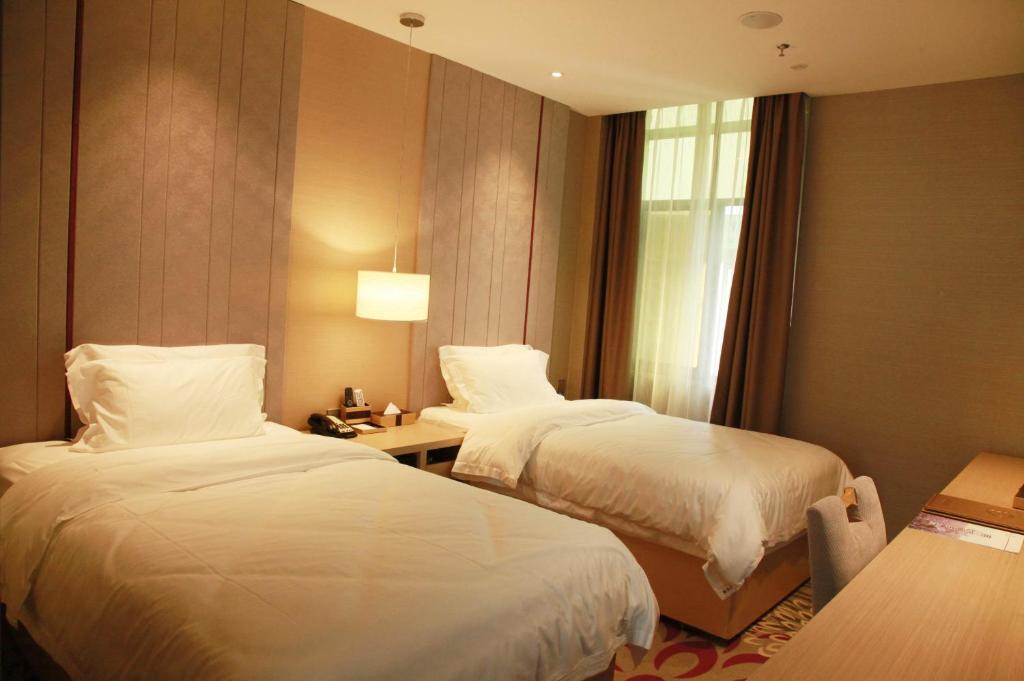 Двухместный (Для граждан материкового Китая - Двухместный номер Делюкс с 2 отдельными кроватями) отеля Lavande Hotel Changsha Dong Tang, Чанша