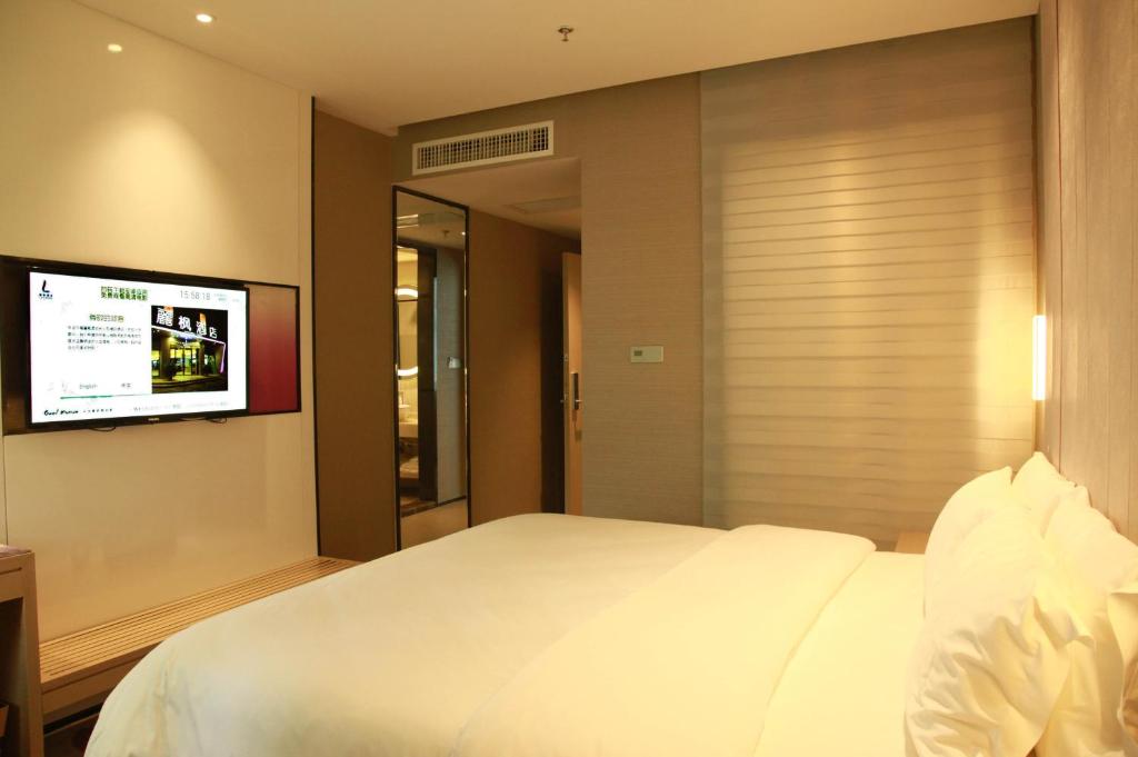 Двухместный (Для граждан материковой части Китая — Номер Делюкс с кроватью размера «queen-size») отеля Lavande Hotel Changsha Dong Tang, Чанша