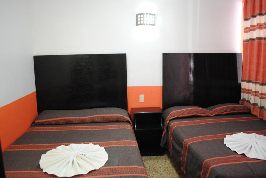 Двухместный (Стандартный двухместный номер с 2 отдельными кроватями) отеля Hotel Jiménez, Оахака-де-Хуарес