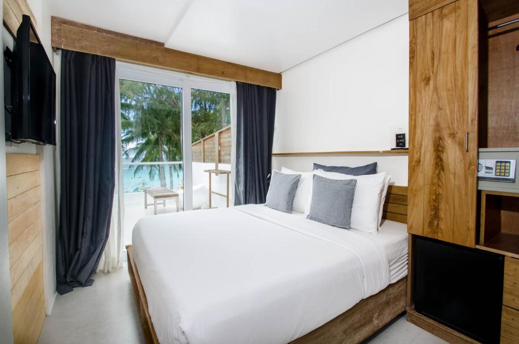 Двухместный (Двухместный номер с 1 кроватью и балконом, рядом с пляжем) курортного отеля Zuzuni Boutique Hotel, Боракай