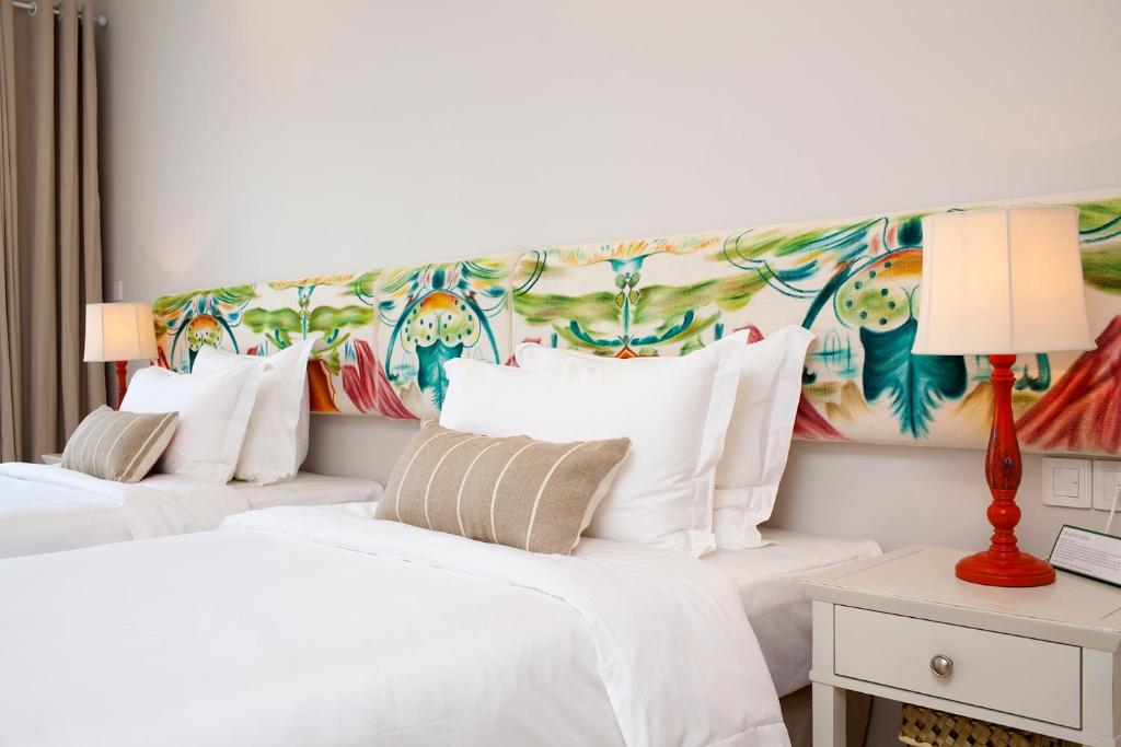Двухместный (Улучшенный двухместный номер с 1 кроватью или 2 отдельными кроватями, вид на сад) курортного отеля Villa Aria Muine, Фантхьет
