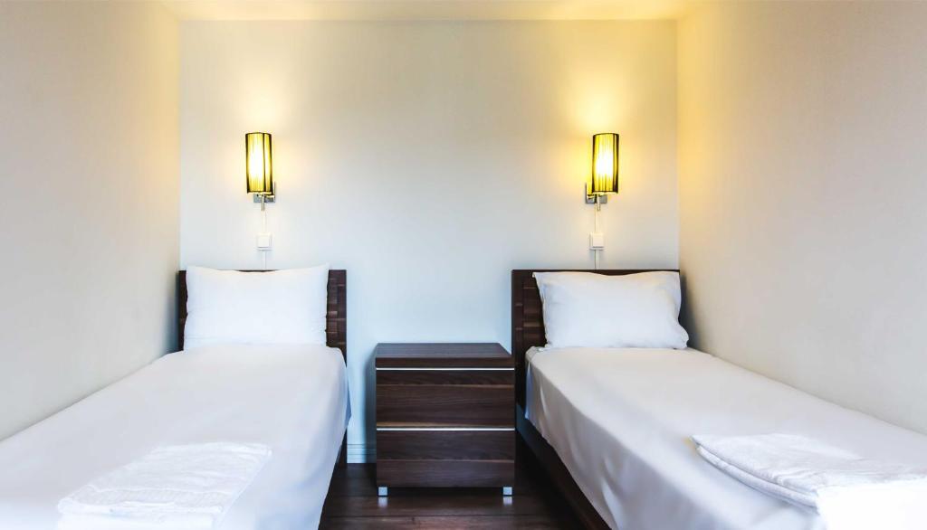 Двухместный (Двухместный номер с 2 отдельными кроватями и основными удобствами) апарт-отеля Central City Apartments, Осло