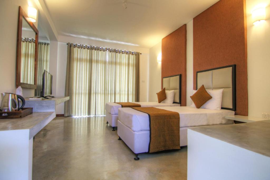 Двухместный (Двухместный номер Делюкс с 1 кроватью) отеля Jade Green Hambantota, Хамбантота