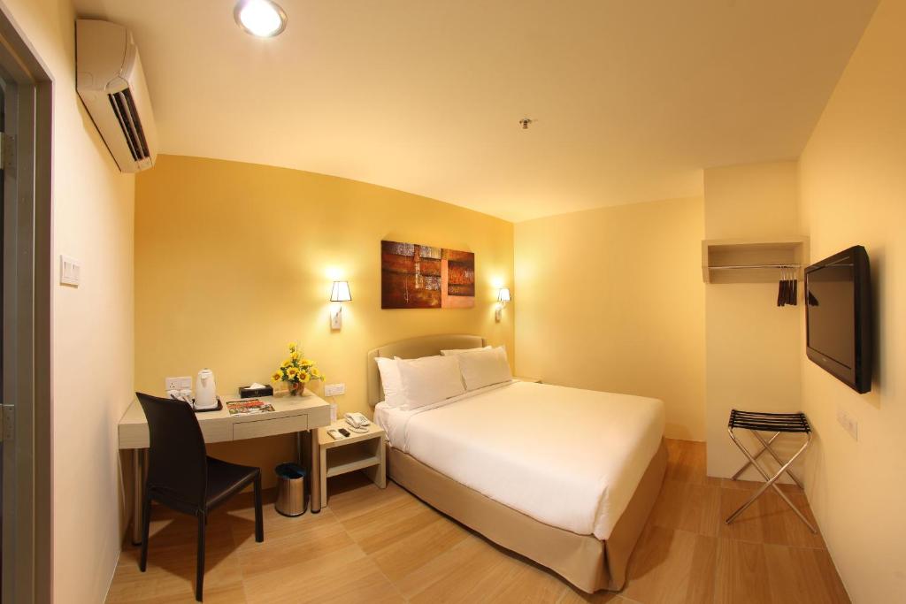 Двухместный (Улучшенный двухместный номер с 1 кроватью или 2 отдельными кроватями) отеля Hotel Min Cott, Куала-Лумпур