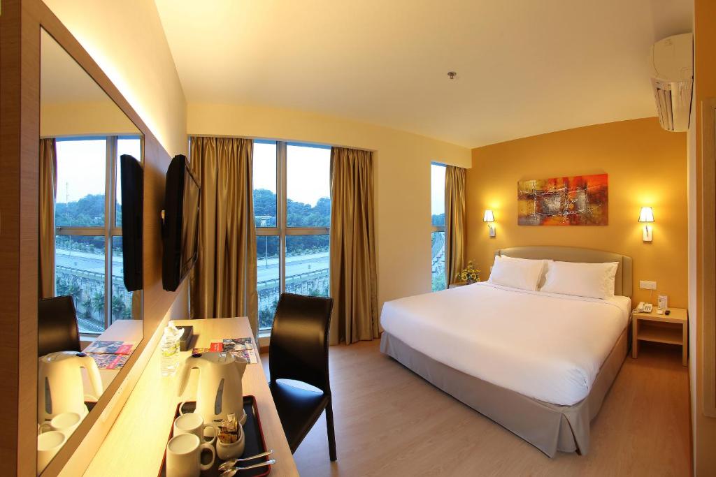 Двухместный (Двухместный номер Делюкс с 1 кроватью или 2 отдельными кроватями) отеля Hotel Min Cott, Куала-Лумпур