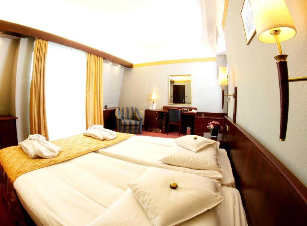 Двухместный (Двухместный номер бизнес-класса с 1 кроватью или 2 отдельными кроватями) отеля Parkhotel Vienna, Бельско-Бяла