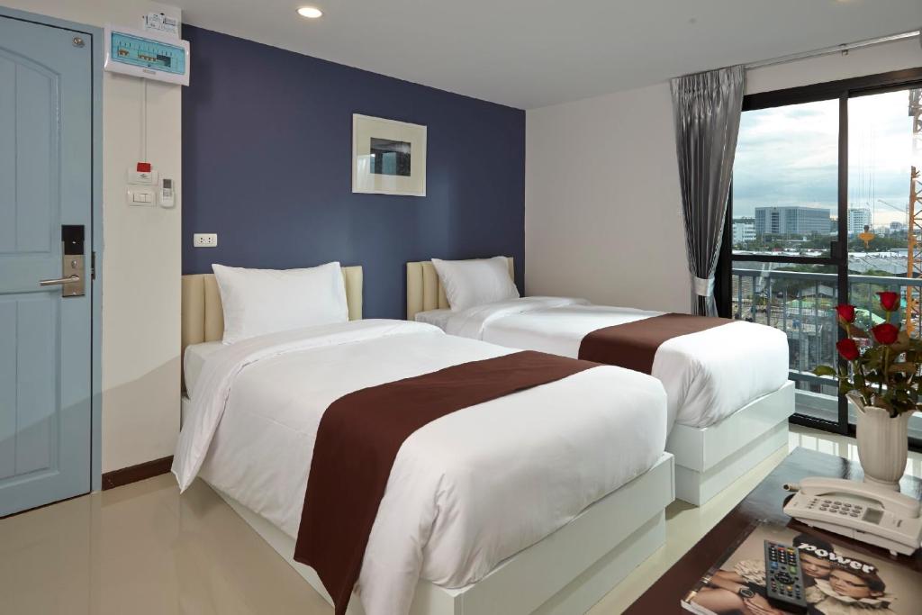 Двухместный (Улучшенный двухместный номер с 1 кроватью или 2 отдельными кроватями) отеля Casa Residence Hotel, Бангкок