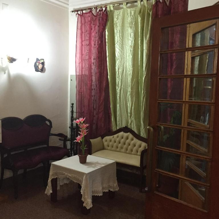 Четырехместный (Четырехместный номер с собственной ванной комнатой) гостевого дома Residencial Central, Калдаш-да-Раинья