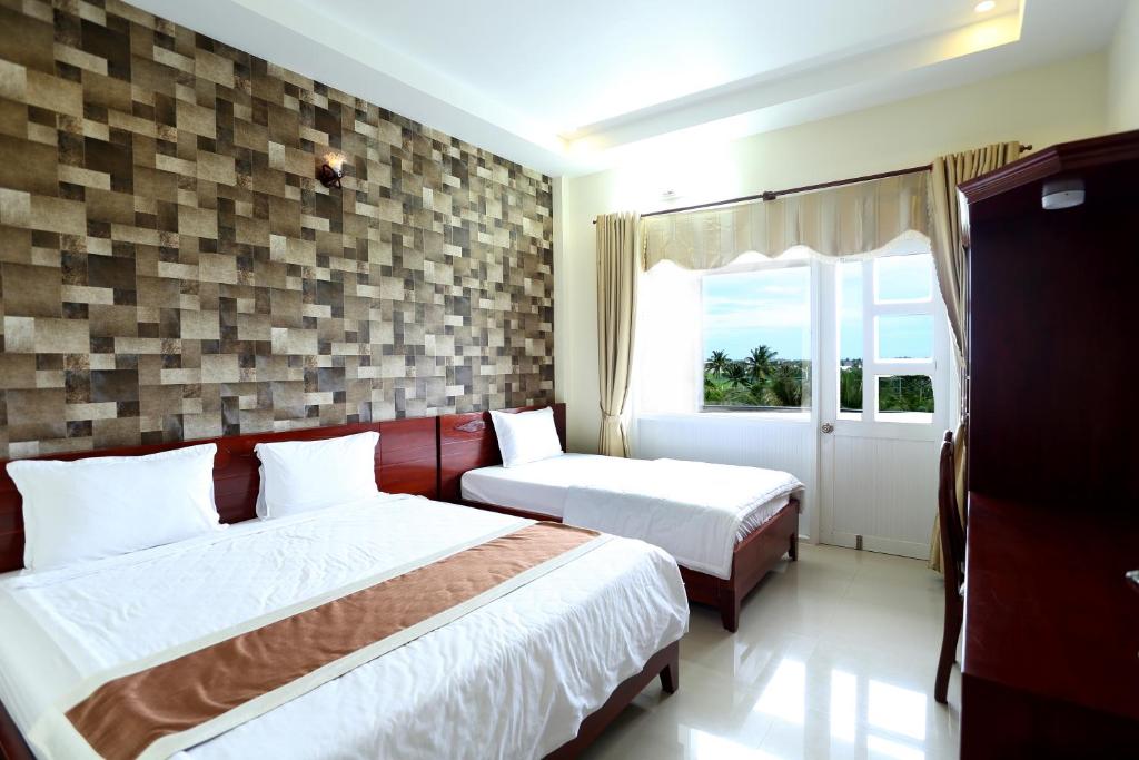 Трехместный (Трехместный номер) отеля Nhat Minh Hotel, Лаги