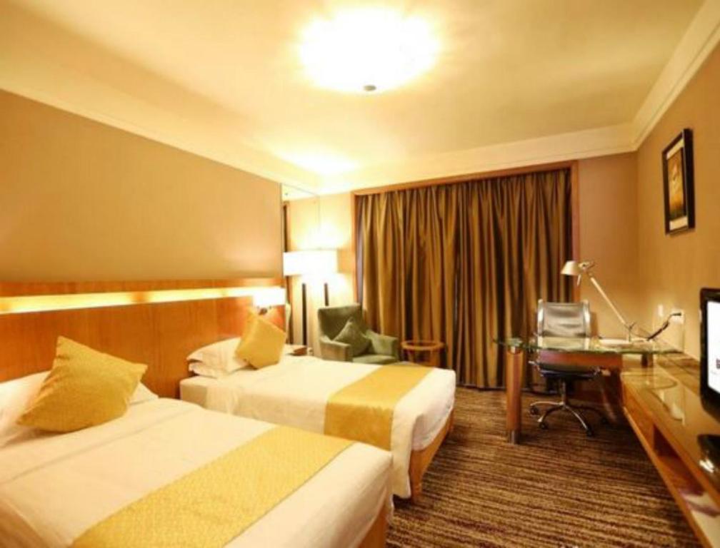 Двухместный (Стандартный двухместный номер с 2 отдельными кроватями) отеля Qingdao KuaiTong International Hotel, Циндао