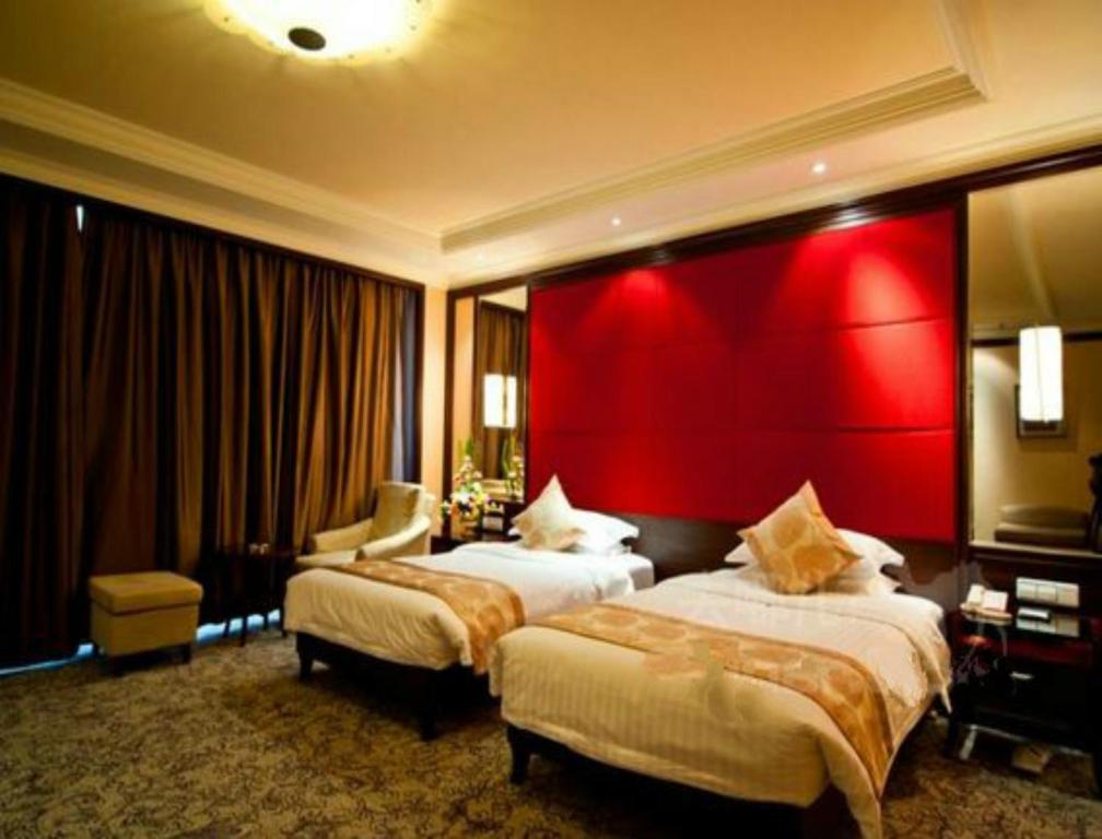 Двухместный (Представительский двухместный номер с 2 отдельными кроватями) отеля Qingdao KuaiTong International Hotel, Циндао