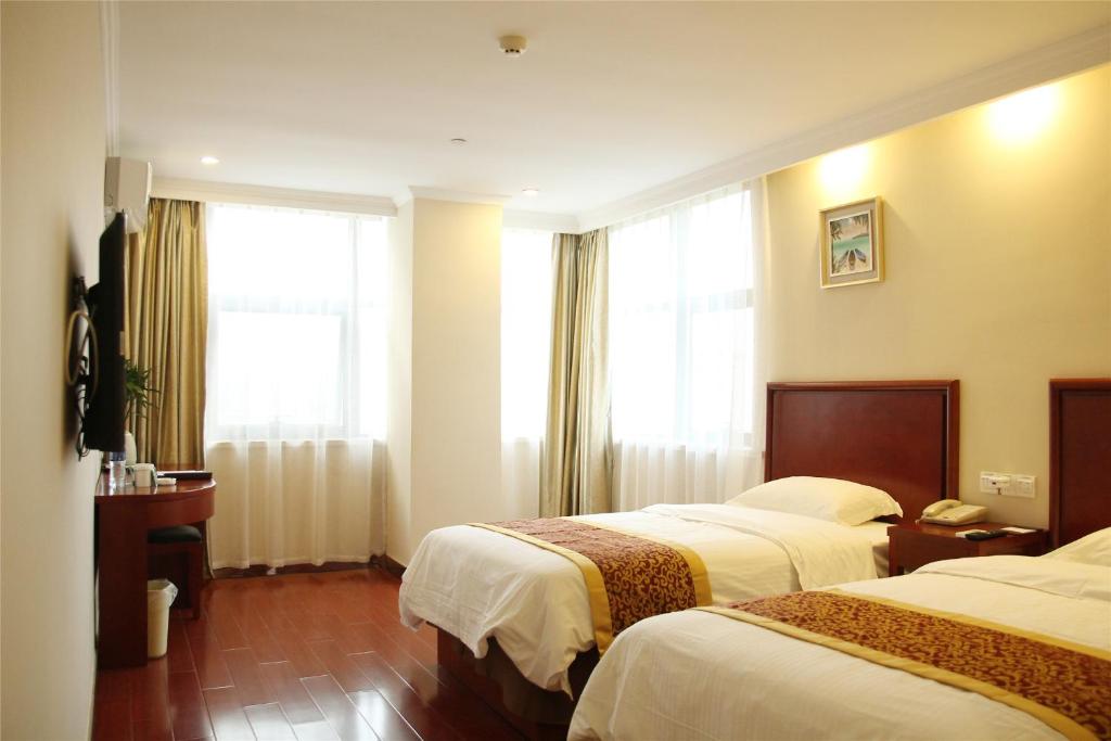 Двухместный (Mainland Chinese Citizens -  Standard Twin Room A) отеля GreenTree Inn Jiangsu Wuxi Yixing Post Building Express Hotel, Исин