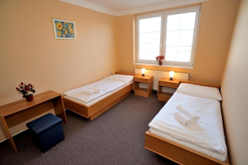 Двухместный (Двухместный номер с 1 кроватью или 2 отдельными кроватями) гостевого дома Penzion Šenk Pardubice, Пардубице