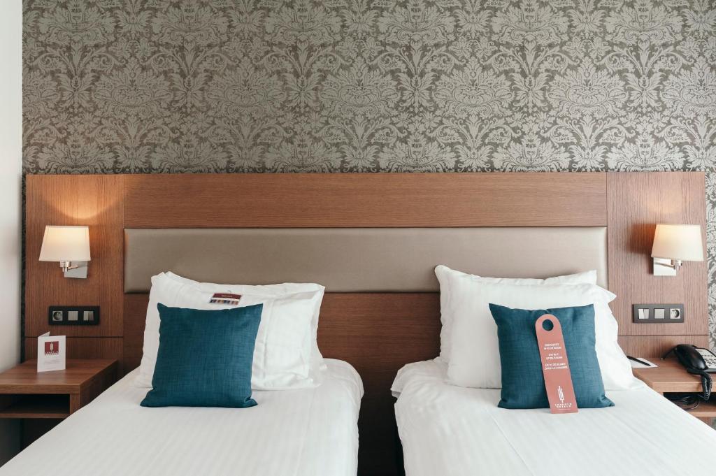 Двухместный (Двухместный номер Делюкс с 2 отдельными кроватями) отеля Hotel Leopold Oudenaarde, Ауденарде