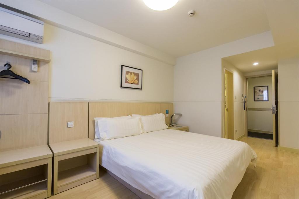 Двухместный (Двухместный номер бизнес-класса с 1 кроватью С) отеля Jinjiang Inn Select Weihai South Haibin Road Haishang Park, Вэйхай