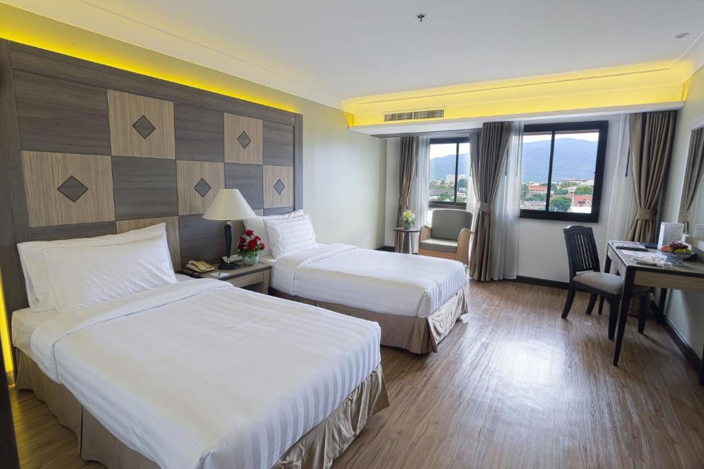 Двухместный (Улучшенный двухместный номер «Гранд» с 1 кроватью или 2 отдельными кроватями) отеля Amora Thapae Hotel Chiang Mai, Чиангмай