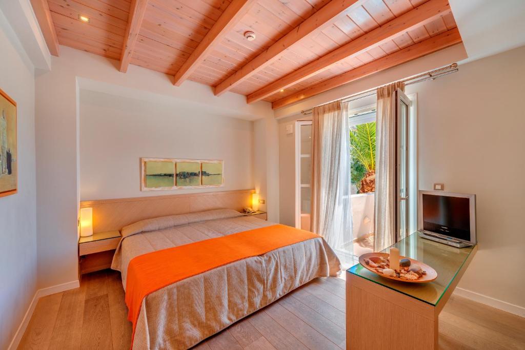 Двухместный (Двухместный номер с 1 кроватью или 2 отдельными кроватями) отеля Nissaki Beach Hotel, Наксос