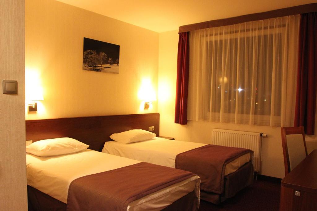 Двухместный (Двухместный номер с 1 кроватью или 2 отдельными кроватями) отеля Hotel Arena Expo, Гданьск