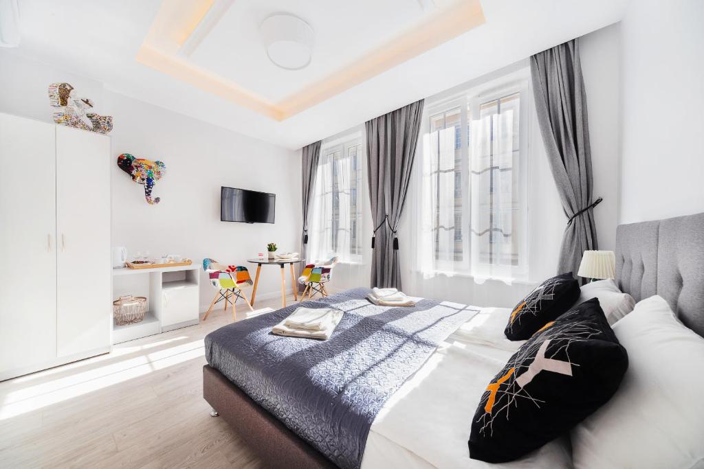 Двухместный (Двухместный номер Делюкс с 1 кроватью или 2 отдельными кроватями, вид на город) апарт-отеля Six Suites, Гданьск