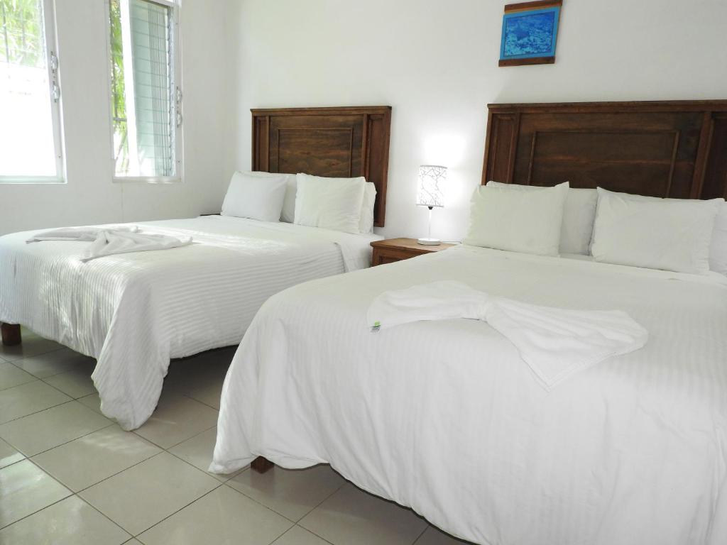 Семейный (Семейный номер с 2 двуспальными кроватями) отеля Apart Hotel Casaejido, Плая-дель-Кармен