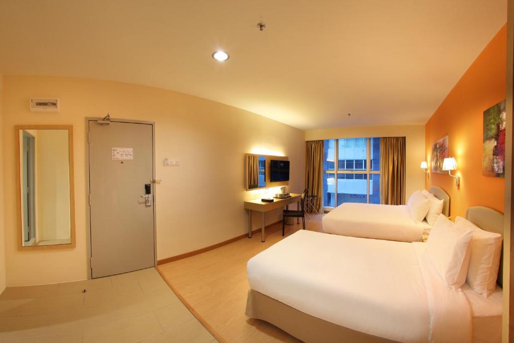 Трехместный (Семейный номер) отеля Hotel Min Cott, Куала-Лумпур