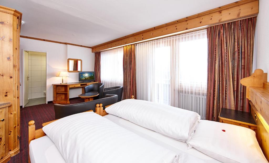 Двухместный (Двухместный номер Делюкс с 1 кроватью) отеля Basic Hotel Arosa, Ароза