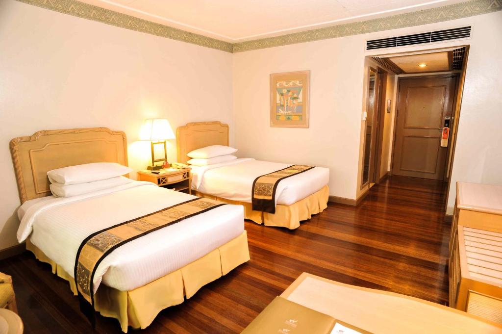 Двухместный (Двухместный номер Делюкс с 1 кроватью или 2 отдельными кроватями) отеля Waterfront Insular Hotel Davao, Давао