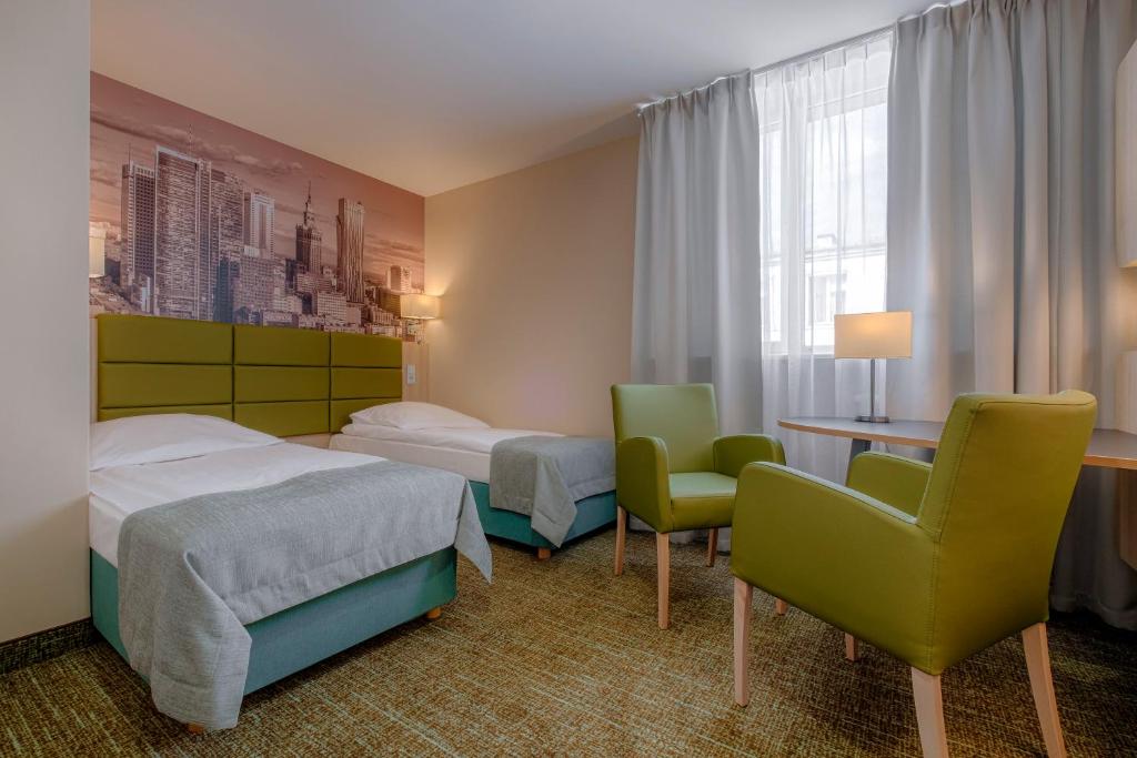 Двухместный (Двухместный номер «Премиум» с 2 отдельными кроватями) отеля Hotel Reytan, Варшава