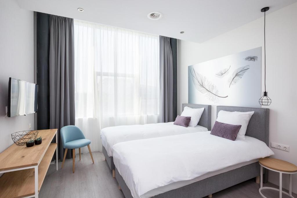Двухместный (Стандартный двухместный номер с 2 отдельными кроватями) апарт-отеля Hotel2Stay, Амстердам