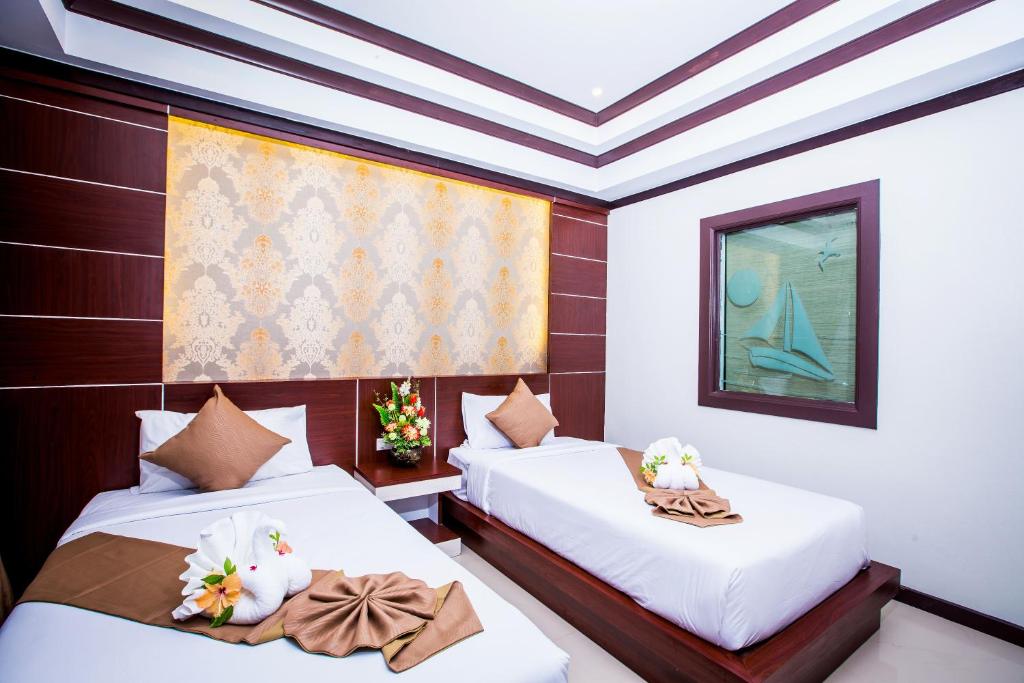 Двухместный (Двухместный номер Делюкс с 2 отдельными кроватями) курортного отеля Phi Phi Andaman Beach Resort, Пхи-Пхи