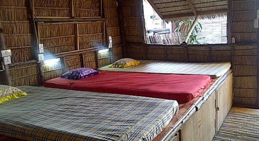 Номер (Кровать в общем 8-местном номере для мужчин и женщин) гостевого дома New Phiman Riverview Guesthouse, Бангкок