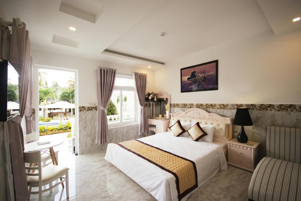 Двухместный (Двухместный номер Делюкс с 1 кроватью) отеля Godiva Villa Phu Quoc, Дуонг-Донг