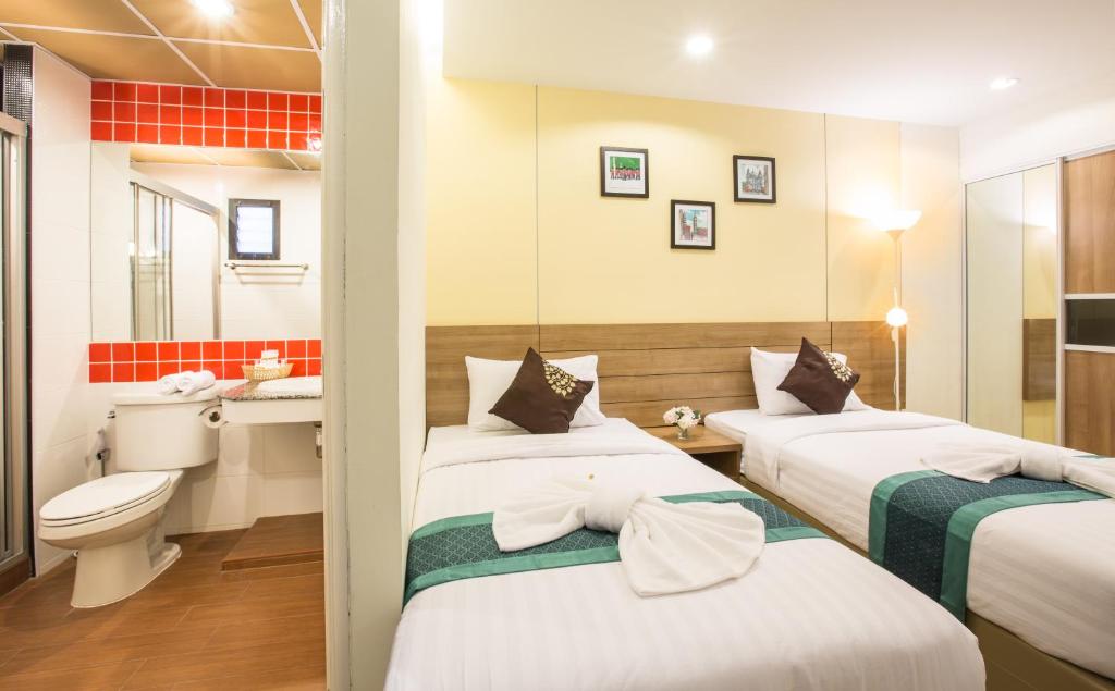 Двухместный (Улучшенный двухместный номер с 2 отдельными кроватями) отеля Viva Residence, Бангкок