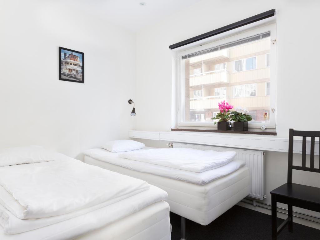 Двухместный (Классический номер с 2 отдельными кроватями и собственной ванной комнатой) хостела Stockholm Hostel, Стокгольм