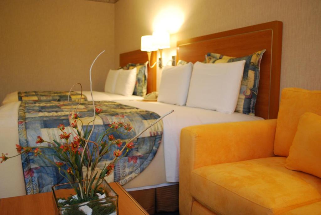 Двухместный (Двухместный номер с 2 двуспальными кроватями) отеля Rio Vista Inn Business High Class Hotel Poza Rica, Поса-Рика-де-Идальго