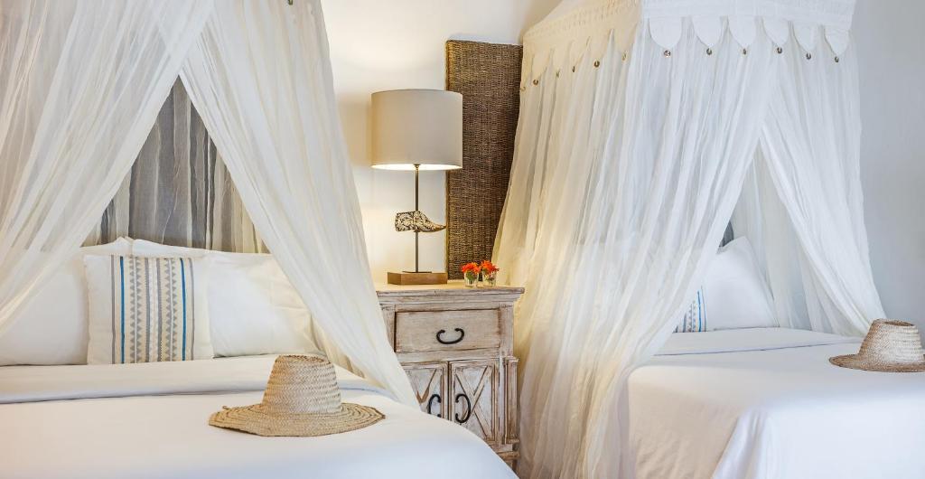 Двухместный (Улучшенный двухместный номер с 1 кроватью и видом на пляж) отеля Casa Sandra Boutique Hotel, Холбокс