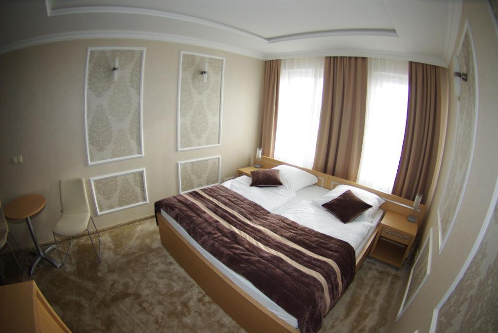 Двухместный (Двухместный номер с 1 кроватью или 2 отдельными кроватями) отеля Hotel Pod Złotą Koroną, Ополе