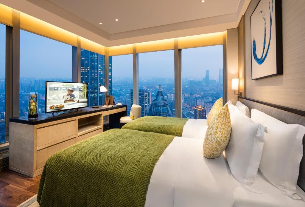 Апартаменты (Номер Делюкс с 2 спальнями - 4 завтрака) апартамента Ascott Central Wuxi, Уси