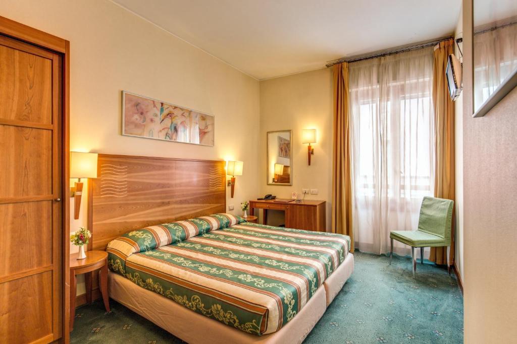 Двухместный (Двухместный номер с 1 кроватью или 2 отдельными кроватями) отеля Hotel Plinius, Комо