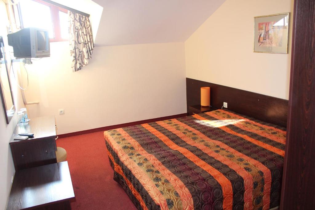 Двухместный (Двухместный номер с 1 кроватью или 2 отдельными кроватями - Мансарда) отеля Отель Елена, Арбанаси