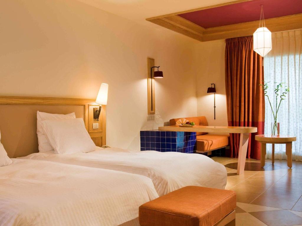 Двухместный ( Стандартный номер с 2 односпальными кроватями, со стороны сада (крыло Palm)) курортного отеля Hotel Novotel Sharm El-Sheikh, Шарм-эль-Шейх