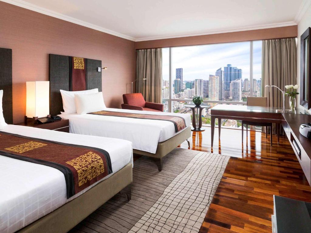 Трехместный (Номер «Премиум Делюкс» с 2 отдельными кроватями — высокий этаж) отеля Pullman Bangkok G, Бангкок